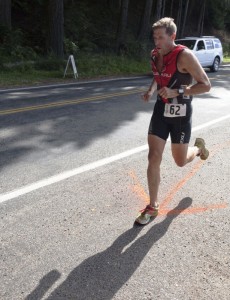 A runner crosses the finish line at the Steve Braun triathalon. Photo courtesy of Martin Taylor 