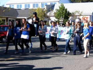 Orcas High School students march by class down North Beach Road in the Homecoming Parade on Friday, Oct. 5. The Homecoming Football game is today at 1 p.m. at Dahl Field. 