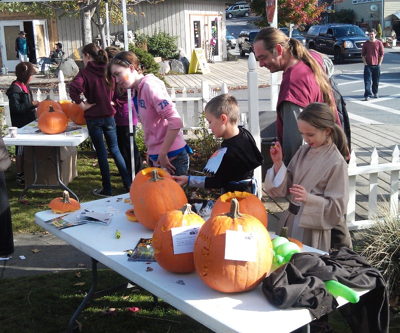 Pumpkin fest 2011 -- face painting, pumpkin carving and hayrides in the sunshine!