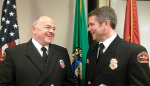 Orcas Island Fire and Rescue Assistnat Chief Mik Preyz and Chief and CEO Kevin O'Brien at Preyz's swearing-in on Jan. 8, 2013