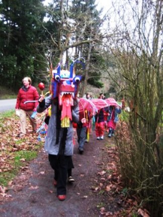 The Salmonberry School students parade a traditional Chinese dragon through Eastsound.