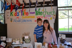 Sarah Shaefer and son, Hayden, at the Fidelis Flea Market