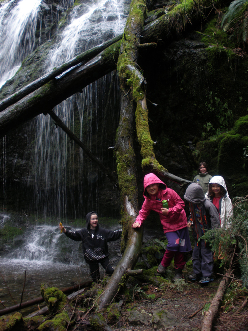 Kids at a waterfall in Moran State Park