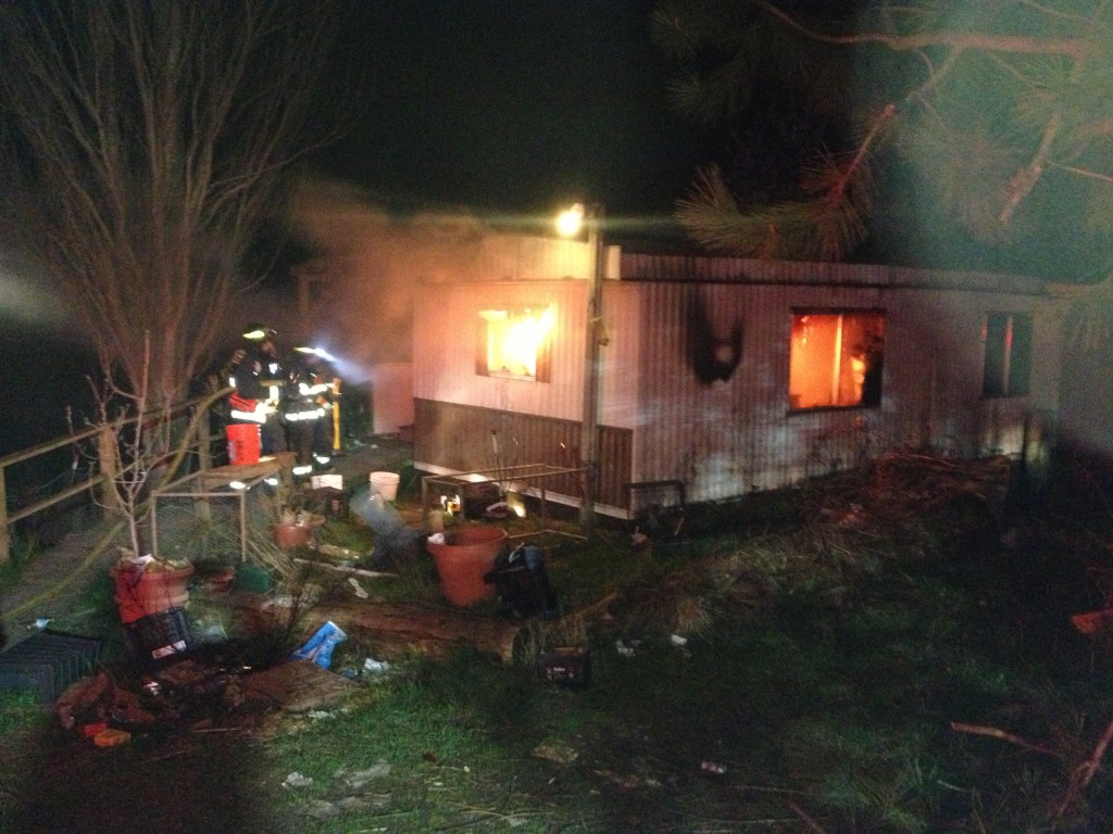 Orcas Fire Fighters stop a fire in a trailer at Dolphin Bay on March 30