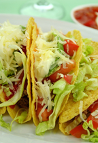 Made-from-scratch tortillas, fresh beef and pork or bean filling, salsas, cheese, lettuce YUM!  