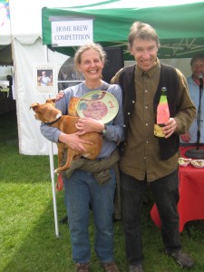 Jim and Rachel proudly display their #1 plate along with their lucky number 13 winning home brew entry.   