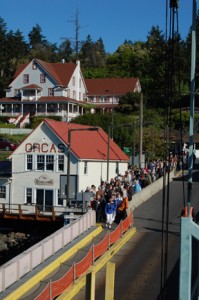 OPALCO members line up for the Annual Meeting aboard the ferry.