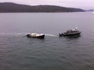 Damaged sailboat in tow after being struck by WSF. Photo: Clyde Duke