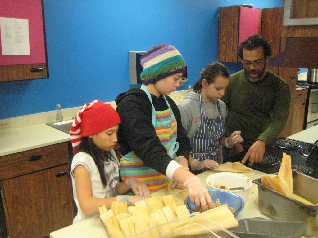  Charles Dalton with Alyssa Johns, Phaedra Osborn and Millie Kau deciding on the proper amount of masa for each tamale.