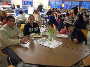 Happy faces at the English Language Learners dinner. Photo: Cara Russell