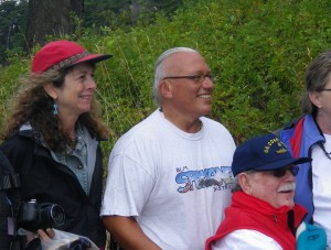 Marcia deChadenedes (BLM San Juan Islands National Monument Manager), Nick Teague (BLM Recreation Specialist) and Patos Bill at the 2013 Patos Lighthouse birthday party, Patos Island. Photo provided by BLM.