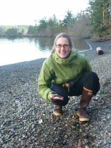 tina holding smelt eggs on a local spawning beach