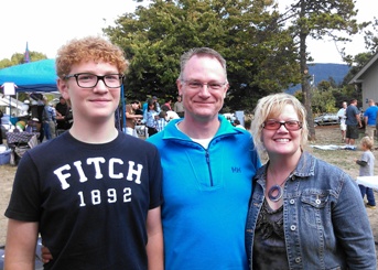 Orcas School District Superintendent Eric Webb, flanked by his son McCabe and his wife Jana