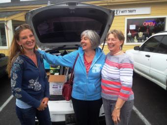 Siloam Parsons, , Lois Christensen and Colleen Billings load up items donated by Score! Nifty Thrifty