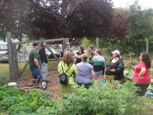 School chef, Zach Holley, talks with students about the garden's role as well as his with school meals.