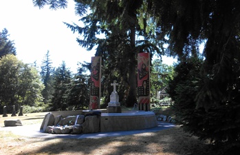 The grave of Chief Sealth in Suquamish, Wash.  The memorial, which was desecrated in 2002, was rebuilt with the words of Chief Sealth inscribed in English and Lushootseed, the Salish language used by Sealth.