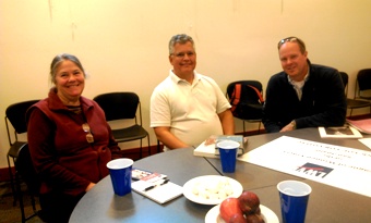 Kathy and Dan Torres register to vote and visit with County Councilman Rick Hughes at the League of Women Voters' registration meeting on Orcas Island