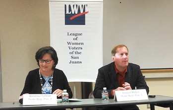 Kris Lytton, left, and Daniel Miller debate the issues the State representative for the 40th District will face.