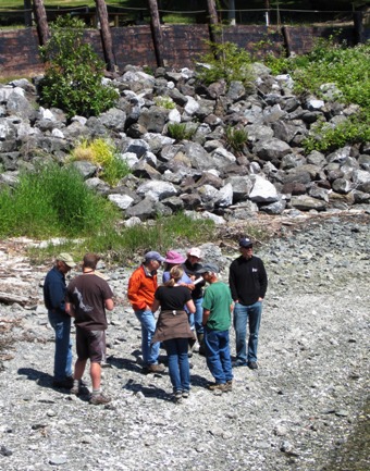 State Salmon Recovery Funding Board review panel members visit the )ocket beach restoration site in June 2014