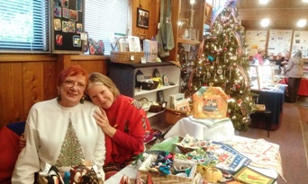 Maggie Kaplan and Sadie Bailey share a booth at the American Legion Auxiliary Bazaar, 2014