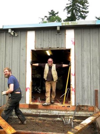 John Steward, with Jay Blackinton lower left, surveys the work he has yet to do. 