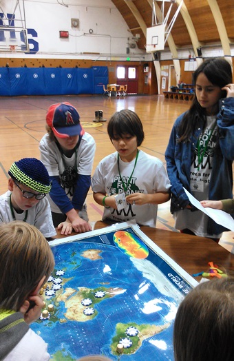 Orcas students become Climate Ambassadors, committed to planting the planet.