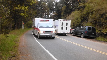 parked cars increase traffic danger on Orcas Road by the ferry landing