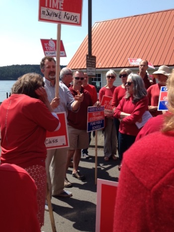 Senator Kevin Ranker joins public education supporters at the "Wear Red for Ed." rally on May 17