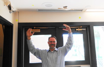 Supt. Webb describes how the water trickled down from the second floor to the main floor of Nellie Milton Elementary School's north addition, built in 1990.