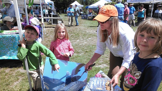 Kids -- and grown-ups too! -- learn about solar power at the Energy Fair 2014