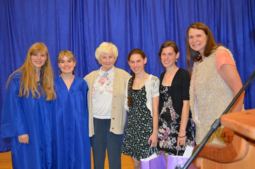 Marilyn Anderson, center, congratulations scholarship award winners