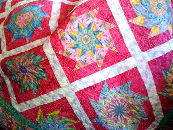 Quilt made by Betty Marcum is traditional part of Olga Daze