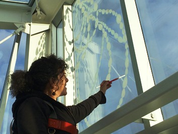 Dana Louise Lyons creating her art installation at San Juan Islands Museum of Art in Friday Harbor