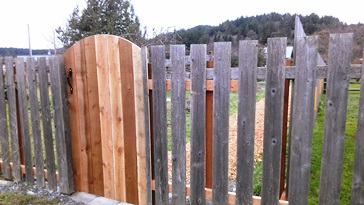 The Gate on Prune Alley to the Public Works' (Fern Street Extension) lot