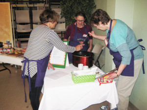 Sampling the finished stew - recipe by Madrona Club member Amy Cole