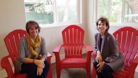 376 Owners Donna Riordan, left, and Sarah Cooper await business owners at their co-working offices in the "Three Chairs" of the reception room.