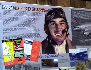 Roy Franklin, with the early aviator's silk scarf and leather helmet 