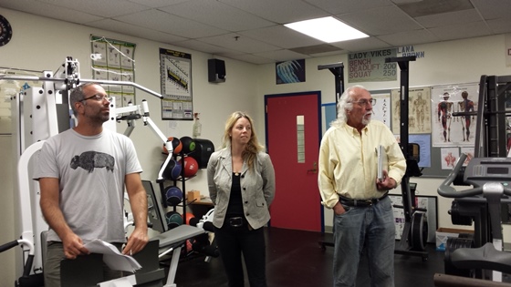 Local builder Ken Katz, Project Manager Liz LeRoy and Fred Klein discuss space concerns in the high school weight room