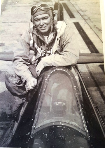 Ensign Harry Patton with his World War II Hellcat fighter