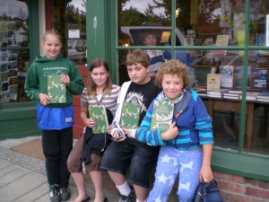 Table of Contents Book Club Members are jazzed about reading their own books. From left, 