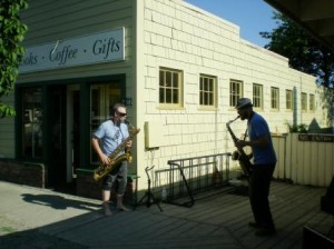 Gregory Books and Al Bently play their saxes, mean and otherwise, outside Darvill's Bookstore.