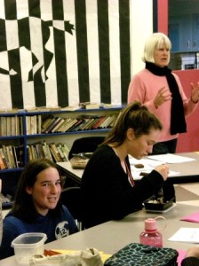 Emilie Gincig,and Ana Ledgerwood enjoy Kay Grossman's Key Club memories as she speaks to the club this week.