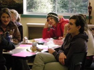 Key Club President Lanie Padbury, right, and other members enjoy Kay Grossman's presentation during Key Club Week, Nov. 2-6