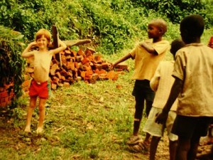 Carl Wilkens' son, Shaun with Rwandan children, in the days before the 1994 genocide.