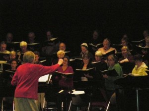 The Orcas Choral Society in rehearsal with Catherine Pederson conducting.