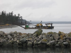 The crane from RedWing that anchored the stormwater outfall at the Port of Orcas