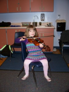 Evie Smith, one of Pamela Wright's first grade string students. 
