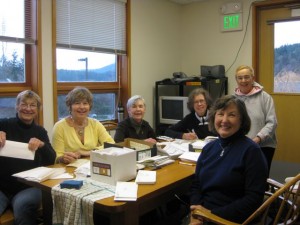 Friends of the Library send out the membership mailings. From left, Pierrette Guimond, Sandy Wilson, Judy Schliebus, Mary Poletti, Barbara Bedell (Friends Chair) and Marilyn Jackson (foreground).