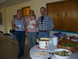 Erin O'Dell, Melonie Eckerson holding daughter Phaedra, and Lion Schoenes. some of the regular crew making lunches on Tuesdays