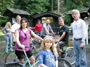 Bikers and friends at the Cascade Summit Challenge. From left, Vicki Leimback, Bill Madill, Vicky Clancy, Michel Vekved (in background) Jim Schuh, Aspen Vekved (in foreground), Paul Evans and Dan Christofferson